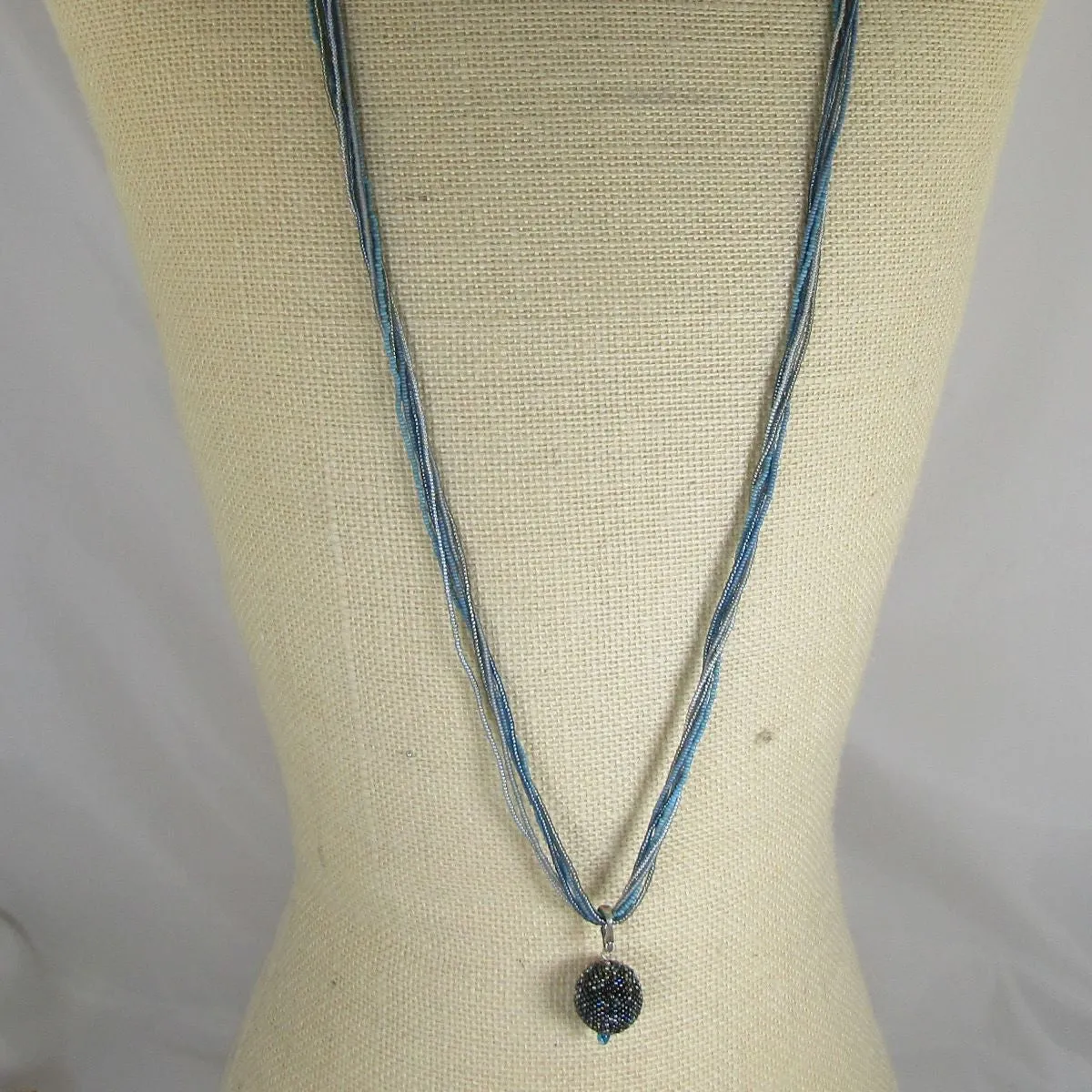 Blue Multi-strand Necklace with Shades of Blue  Ball Pendant