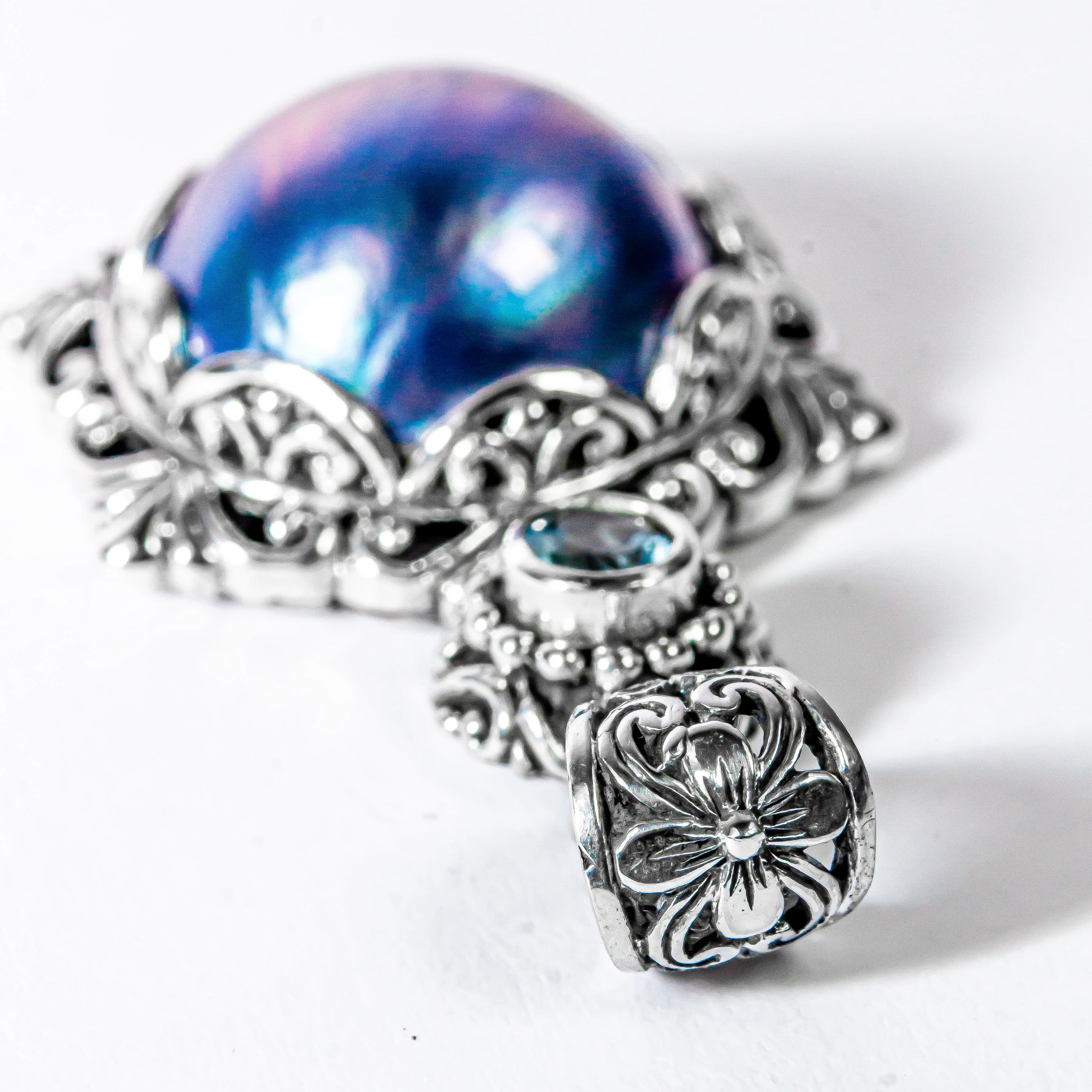 Enchanting Bali Handmade Peacock Mabe Pearl and Sky Blue Topaz pendant in Sterling Silver