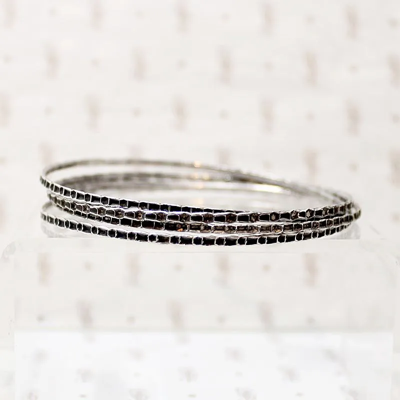 Set of Four Slim Sterling Silver Bangles
