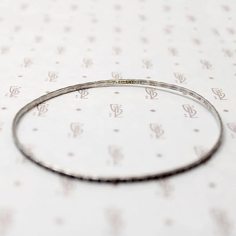 Set of Four Slim Sterling Silver Bangles