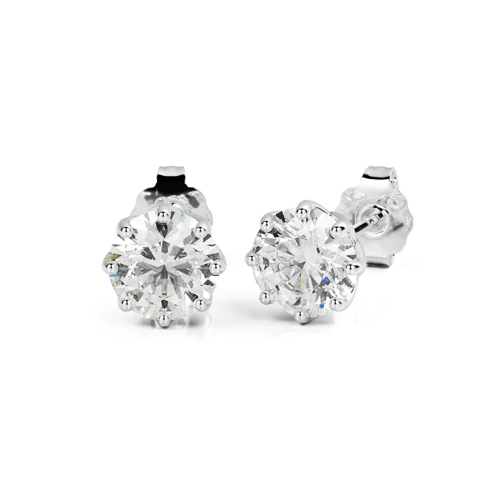 Solar Energy Clasps Earrings 2 Natural Diamonds in White Gold