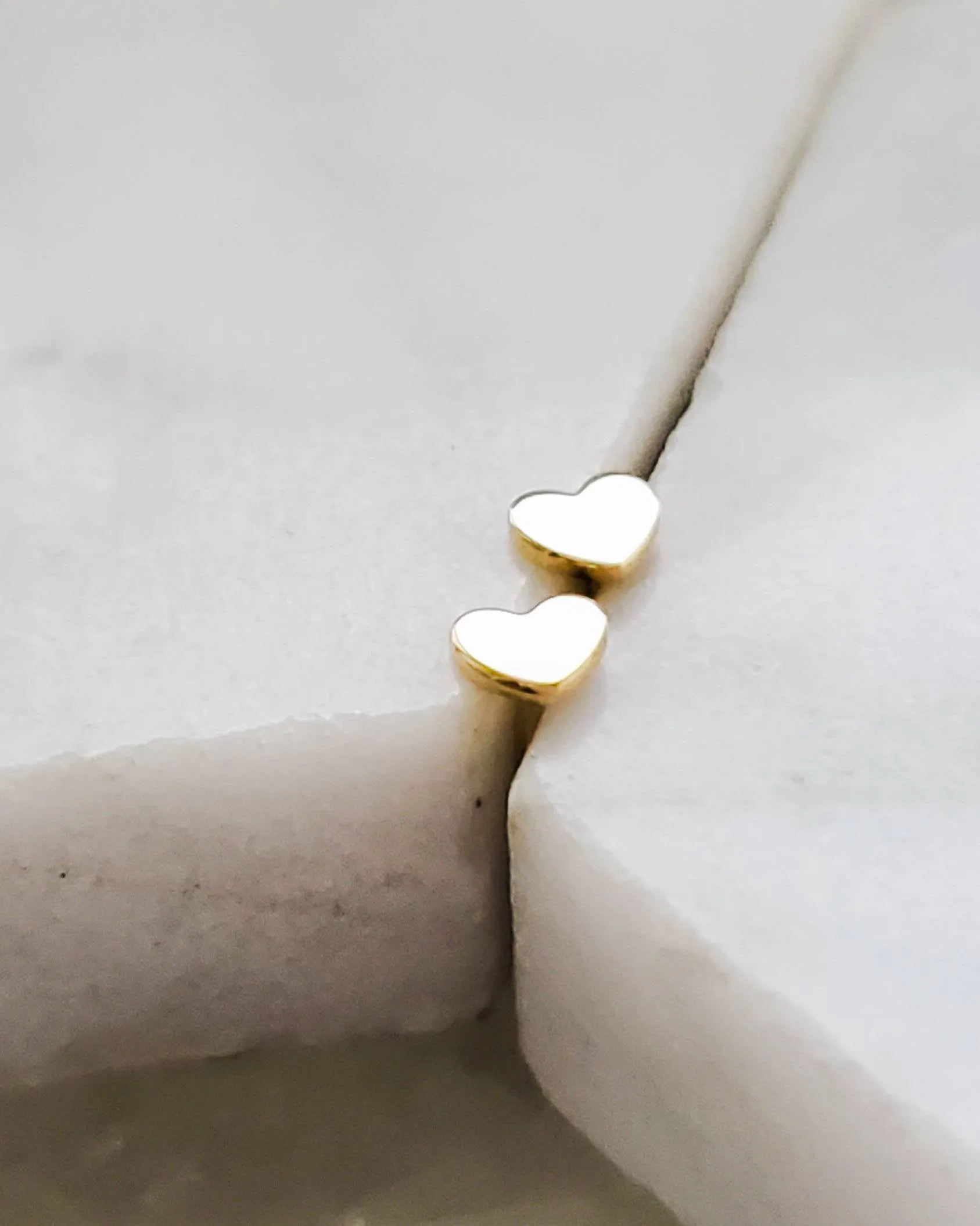 Tiny Heart Studs in 14k Gold